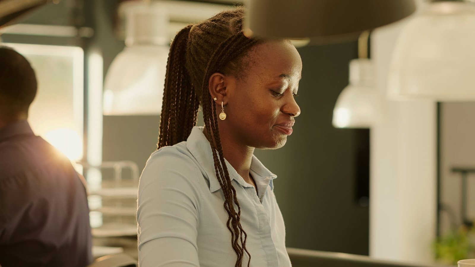 African american woman planning presentation data on computer