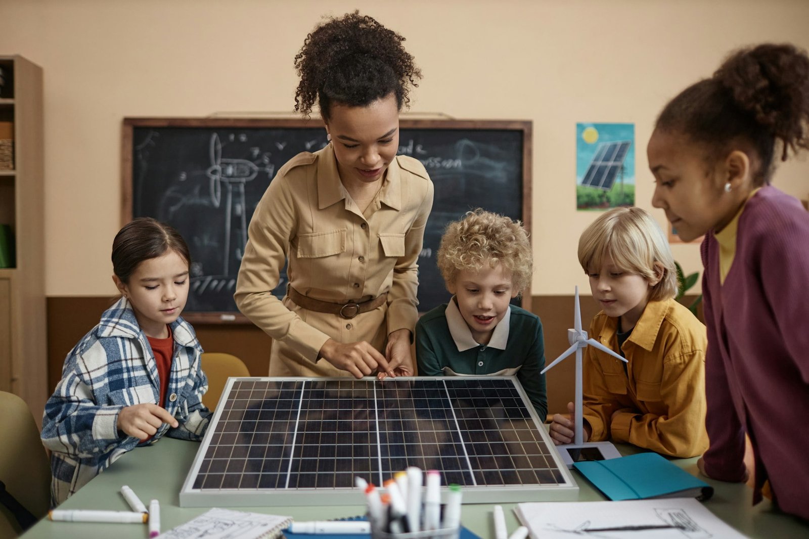 Diverse Group of Children Learning About Renewable Energy