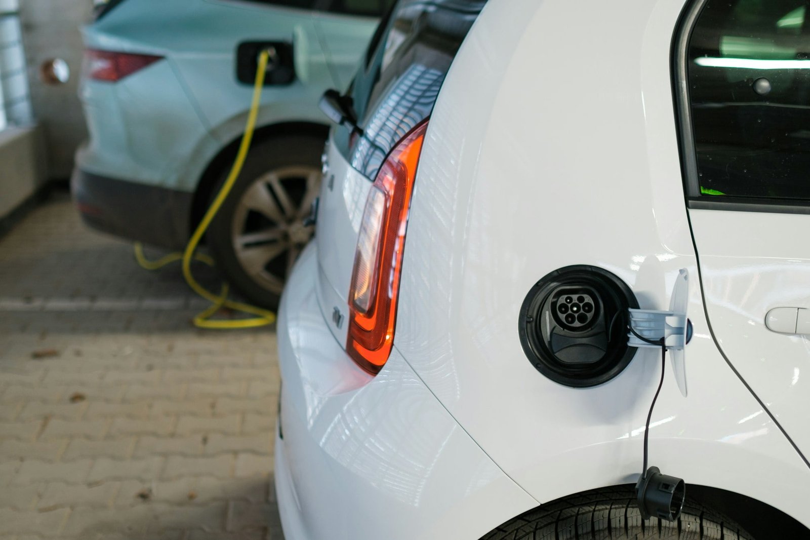 Electric cars charging at the charging station. Zero emission cars