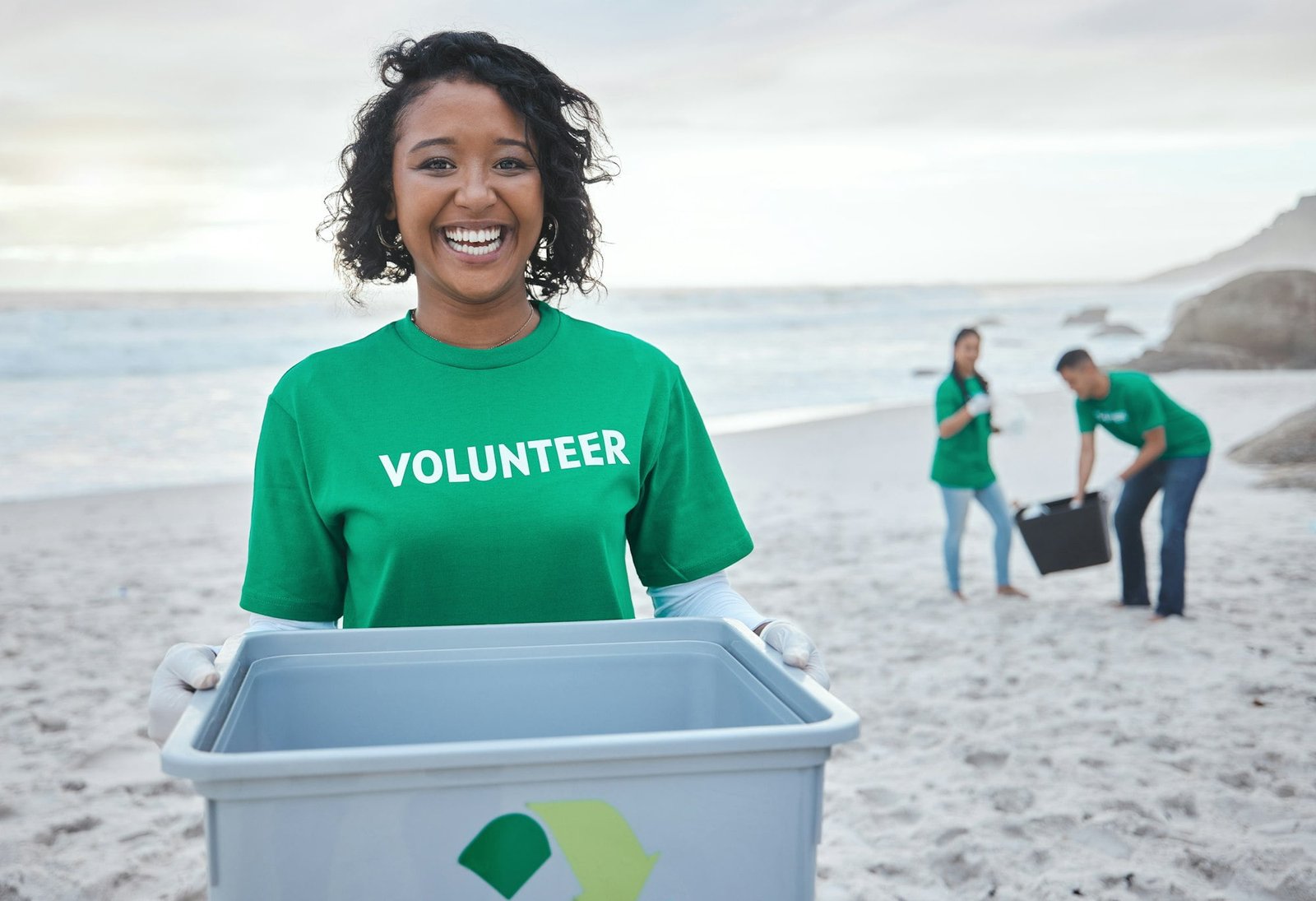 Recycle, smile and portrait of woman at beach for plastic, environment or earth day cleaning. Recyc