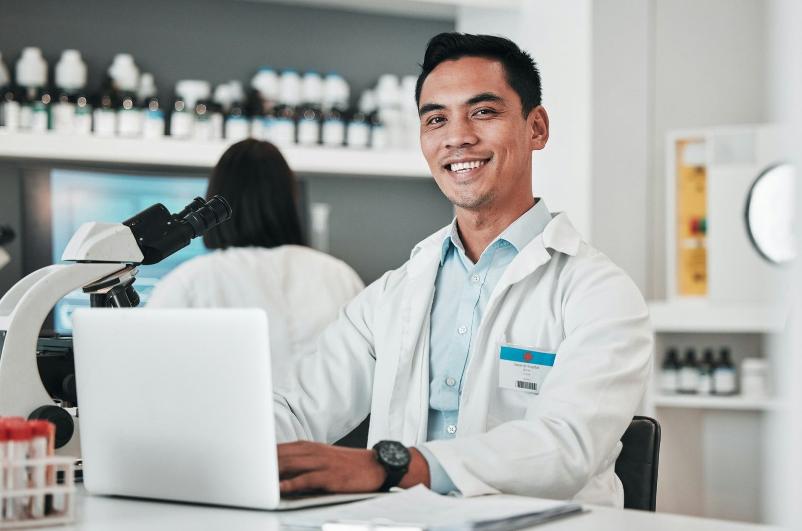 Science, man and portrait at laptop in laboratory for planning innovation, research and biotechnolo