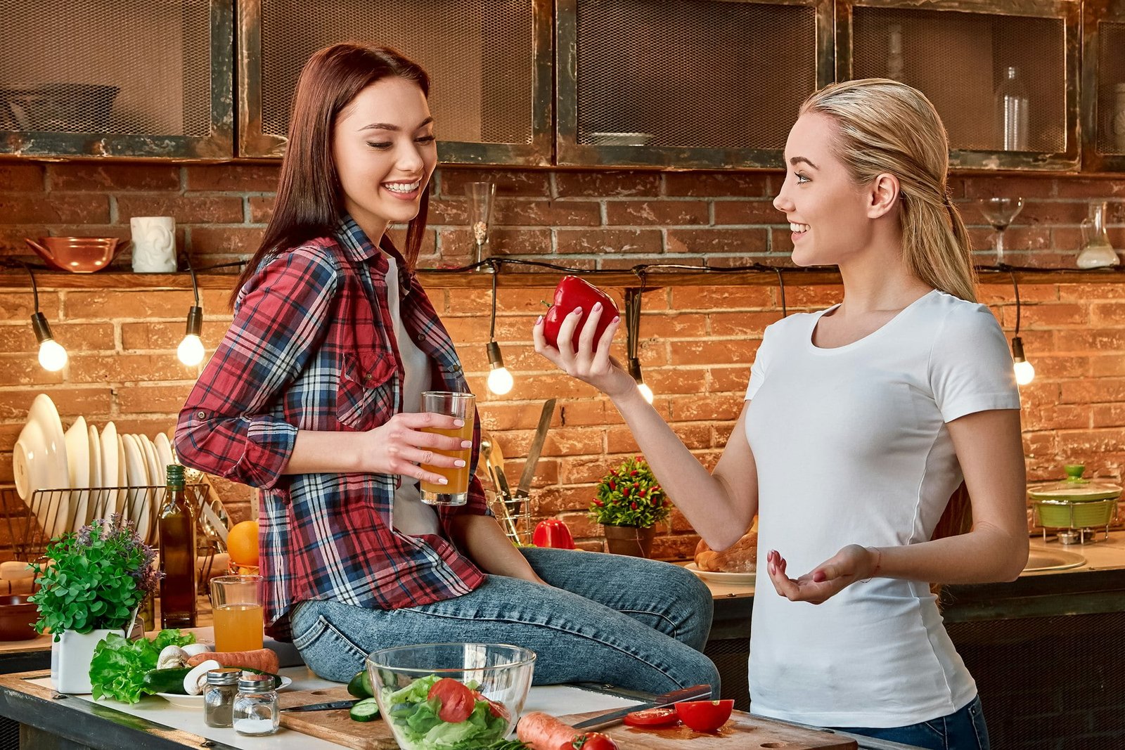 Watch what you eat today, so tomorrow you can keep diseases away. Young female friends preparing